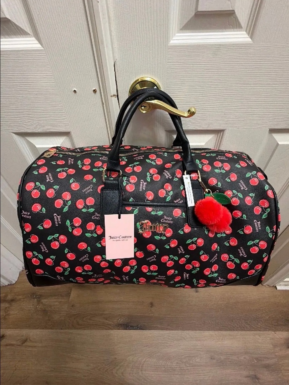 Juicy Couture Black Cherry Print Travel Duffel with Red Pom Pom